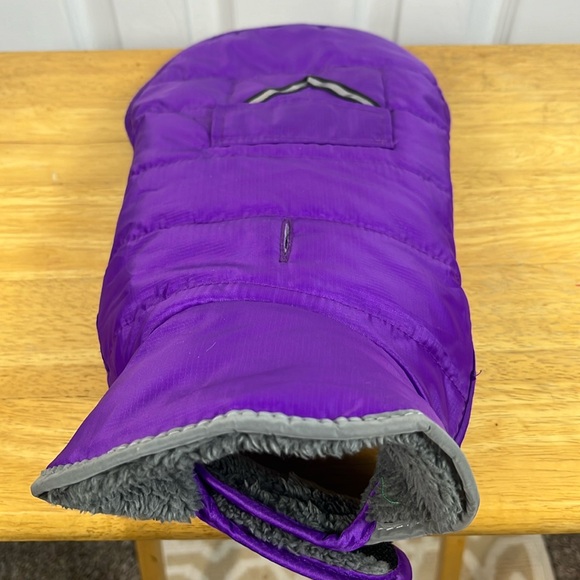 Purple with grey lining dog jacket size small. Has 2 velcro straps. Pocket front - Picture 1 of 5